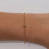 Pulsera con inicial de burbuja