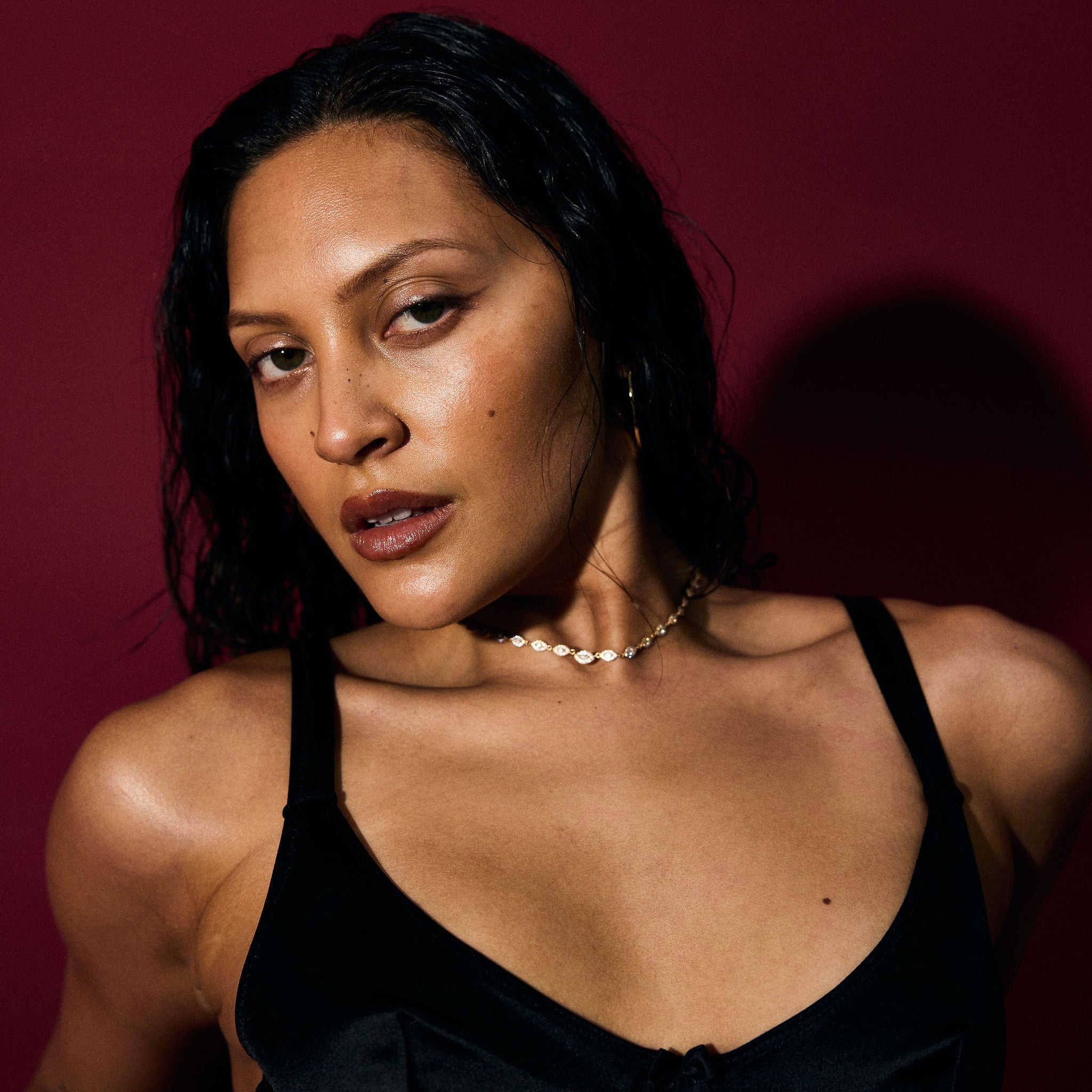 Woman wearing a Clear Evil Eye Tennis Necklace