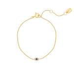 A gold vermeil bracelet with a cable chain and a pavé evil eye design featuring cubic zirconia stones, displayed against a white background.