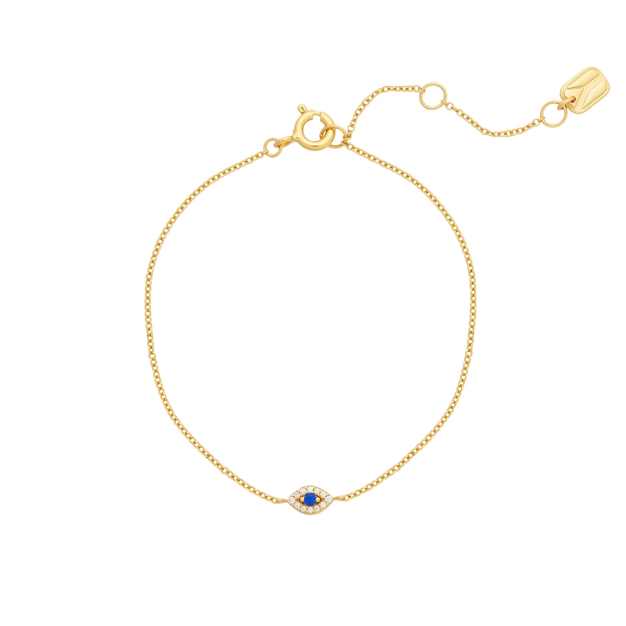 A gold vermeil bracelet with a cable chain and a pavé evil eye design featuring cubic zirconia stones, displayed against a white background.