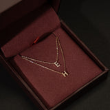 Collar con inicial pavé