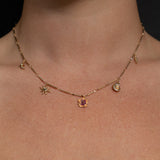 Collar con dije de rayos