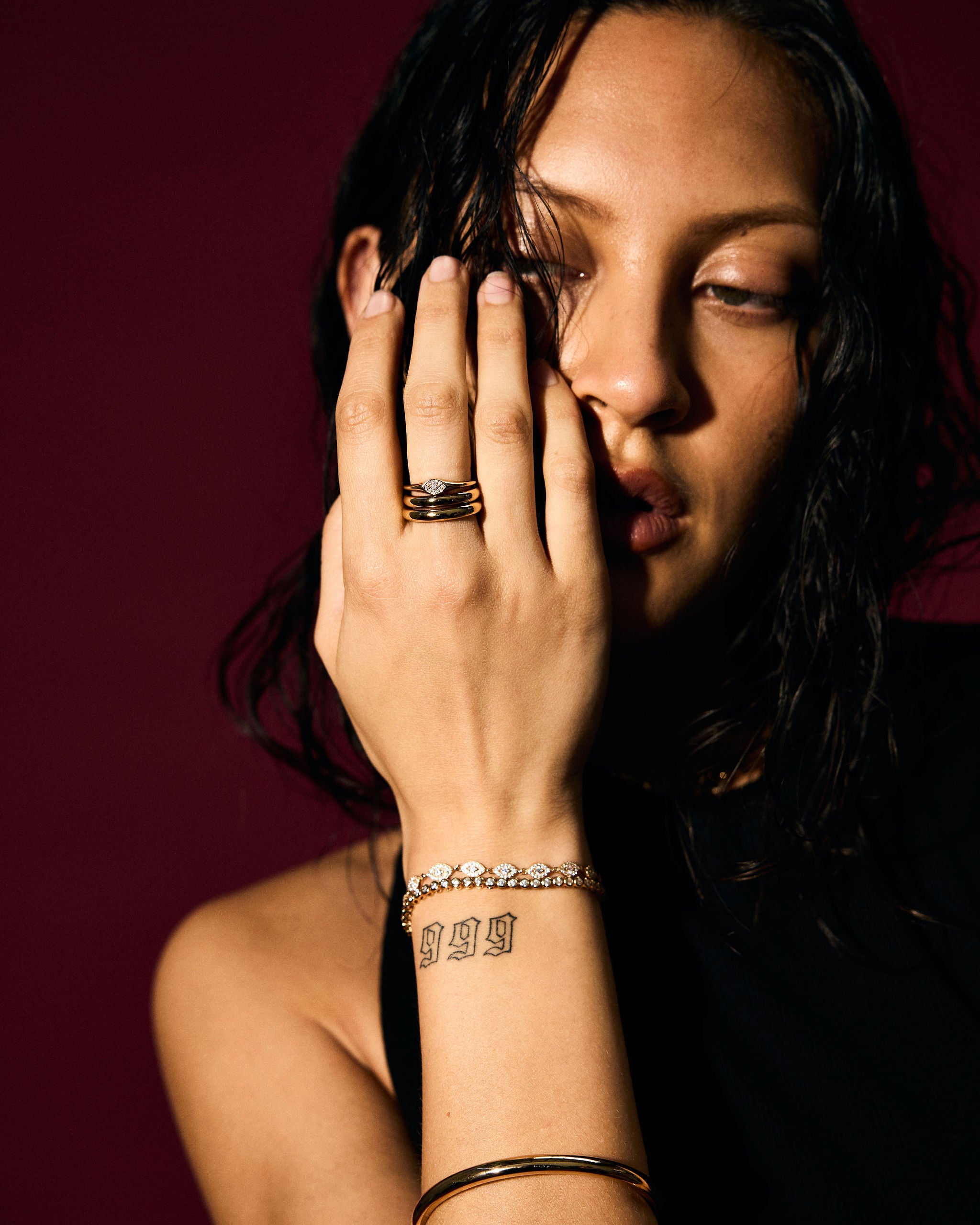 Woman with jewelry on a dark background