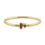 Gold bracelet with red heart-shaped charms on a white background