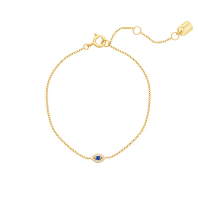 A gold vermeil bracelet with a cable chain and a pavé evil eye design featuring cubic zirconia stones, displayed against a white background.